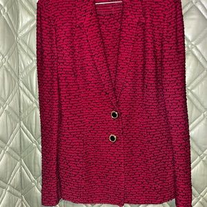 Excellent burgundy pink and black two piece suit,smoke free and pet free home.